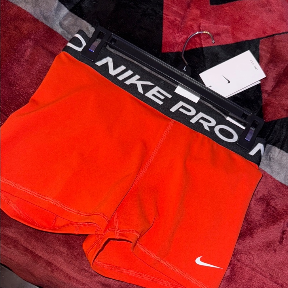 Nike Women's Orange Pro Shorts